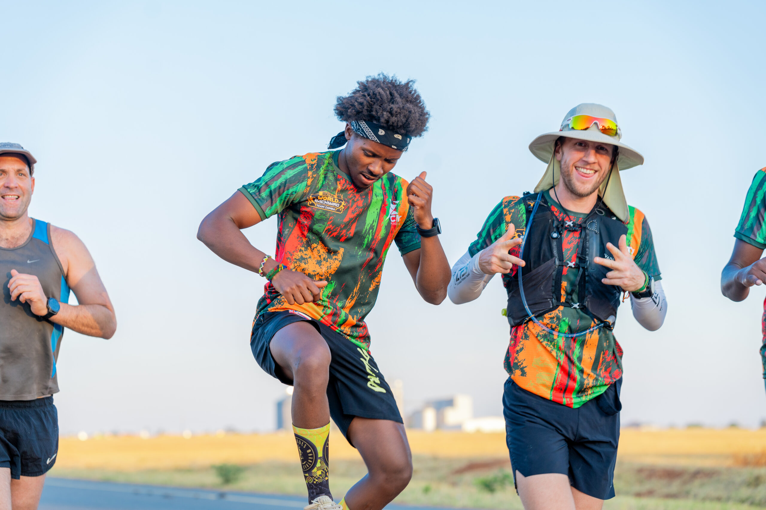 Runners in action with vibrant jerseys